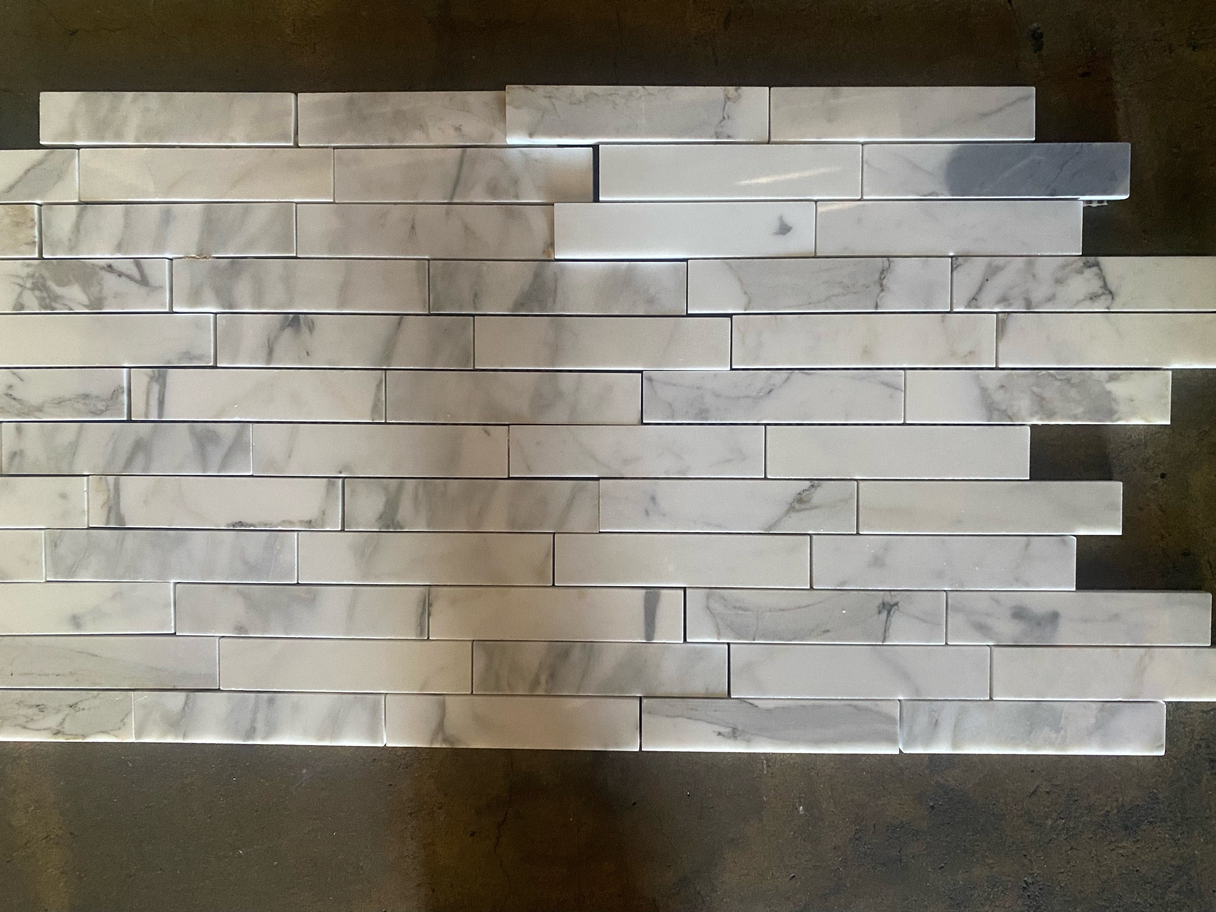 Calacatta Gold Marble 1x6 Staggered Mosaic Tile (Closeout))